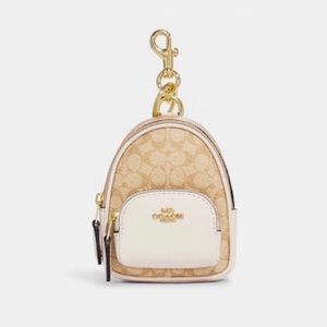 oach Mini Court Backpack Bag Charm In Signature Canvas
